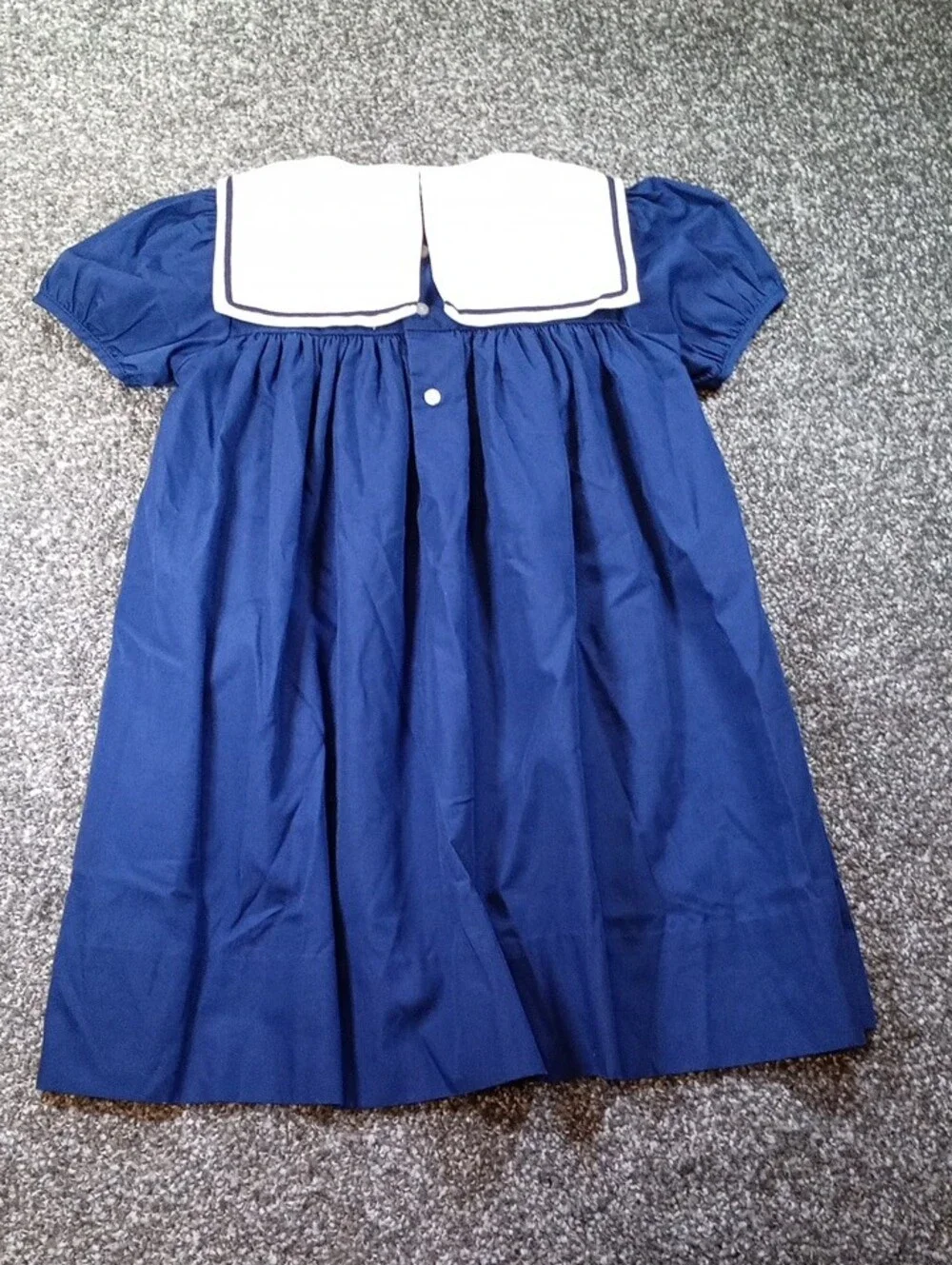 Mignon Navy and White Sailor-Trim Top with Red Bow Accent